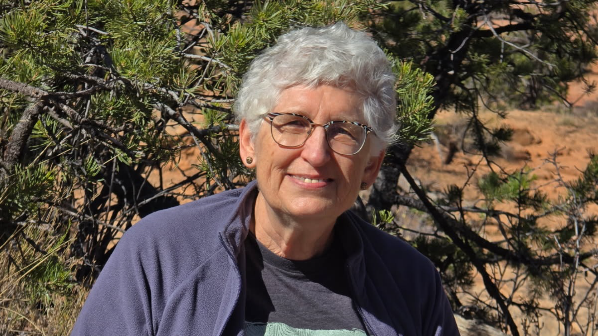 Picture of Norma in front of chaparral vegetation