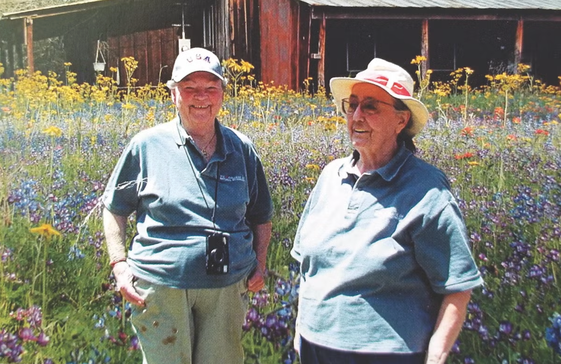 Casey Stengl (right) and her partner Lorraine Wyer in the Stengl Lost Pines wildflower meadow.